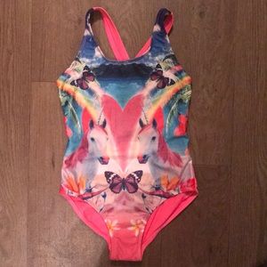 Girls’ swimsuit. Size M (7/8)